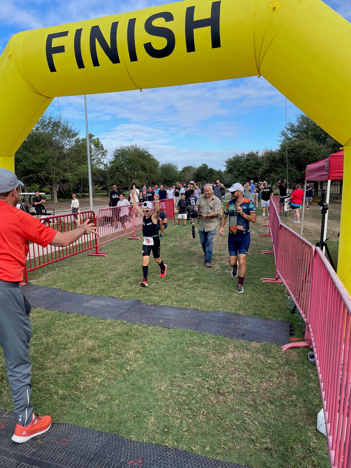 Nico Reyes prepares to cross the finish line in the Katy Triathlon at Cane Island on October 29th.